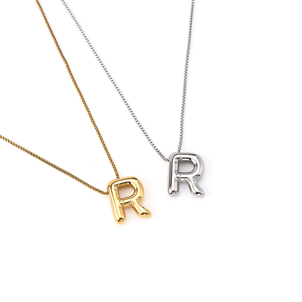 colar inicial bubble dourado aço inox 316l
Colar com letra R
colar inicial bubble prateado aço inoxidável