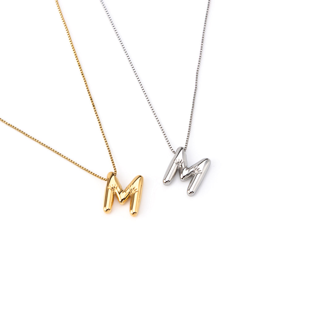 colar inicial bubble dourado aço inox 316l
Colar com letra M
colar inicial bubble prateado aço inoxidável