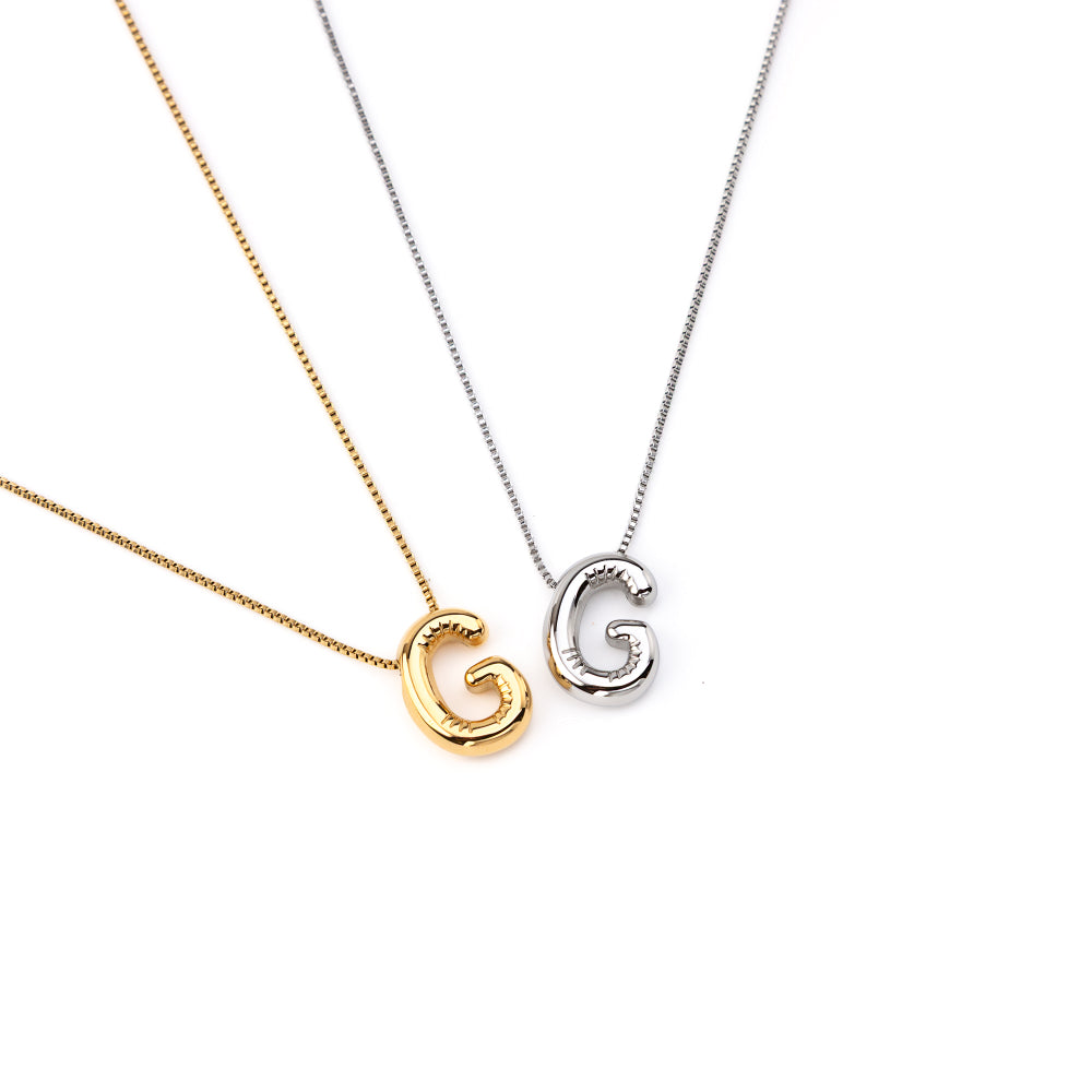 colar inicial bubble dourado aço inox 316l
Colar com letra G
colar inicial bubble prateado aço inoxidável