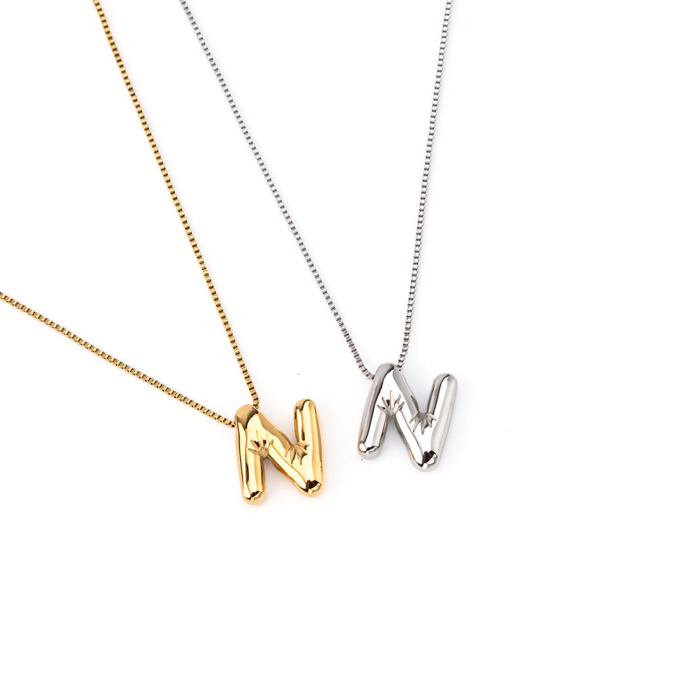 colar inicial bubble dourado aço inox 316l
Colar com letra N
colar inicial bubble prateado aço inoxidável