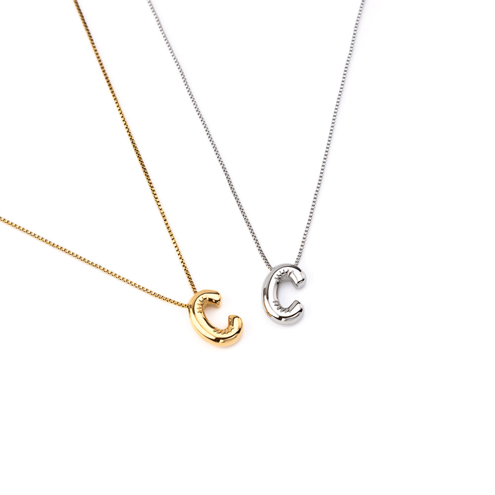 colar inicial bubble dourado aço inox 316l
Colar com letra C
colar inicial bubble prateado aço inoxidável